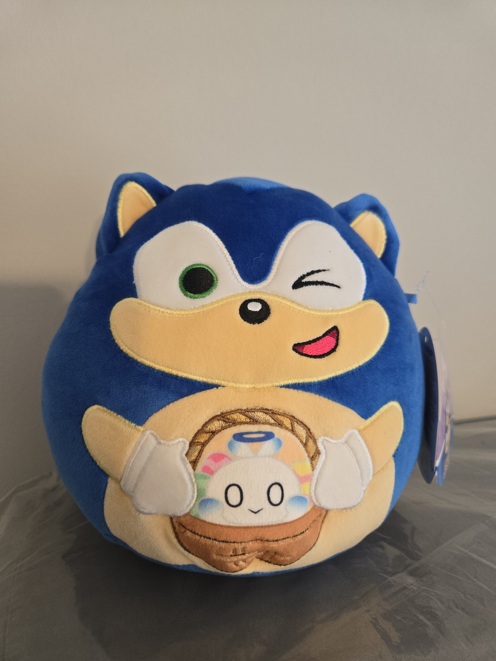 Blue Winking Character Plush with Basket Design